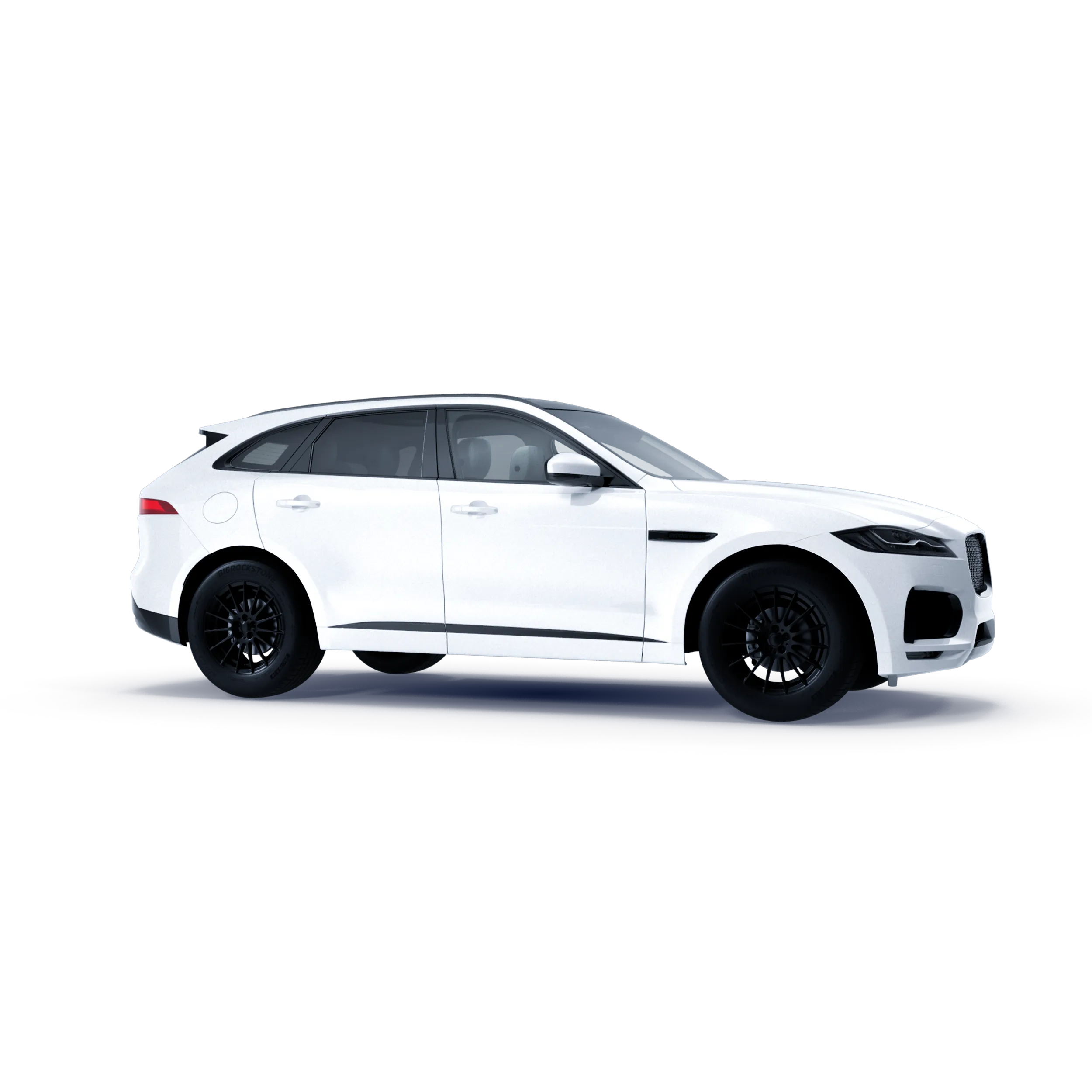 Perfil lateral de una SUV Jaguar F-Pace blanca con rines deportivos negros y techo panorámico.